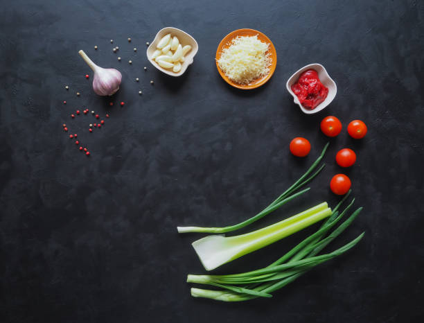 istock Ingredients for spaghetti on a black background. Copy space for your text 955221762