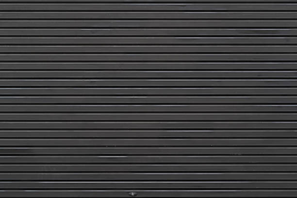 istock Black wood fence texture and background seamless 955226422