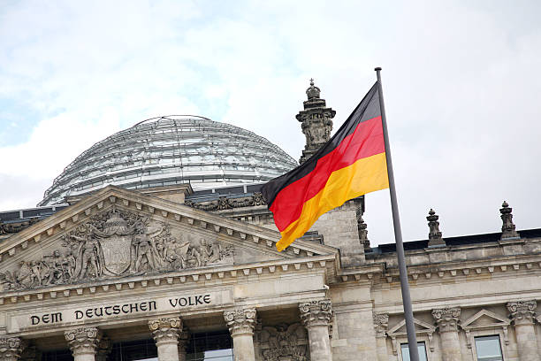 istock Berlin Reichstag and german flag 95522985