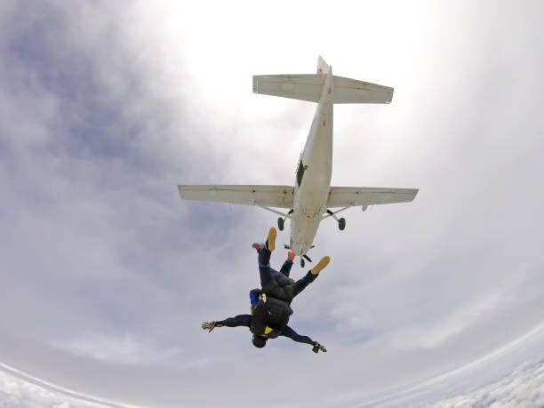 istock Skydive Tandem jump out of the plane 955237060