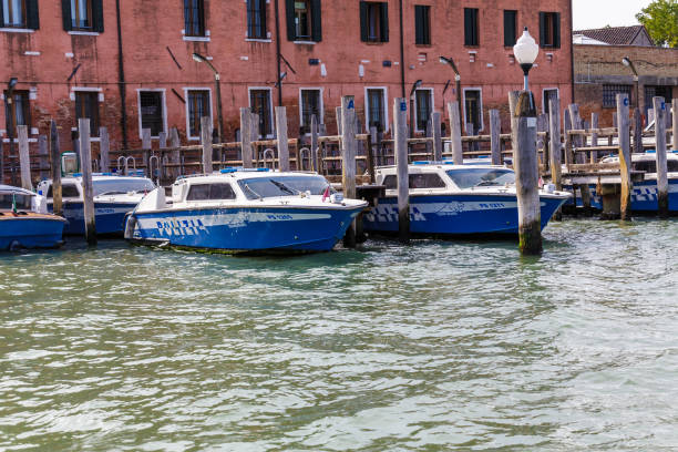 Group of Police Boats Docked in Venice Harbor