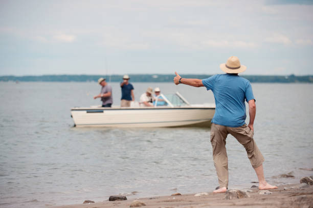 istock Five active seniors brothers on a fishing trip 955241140