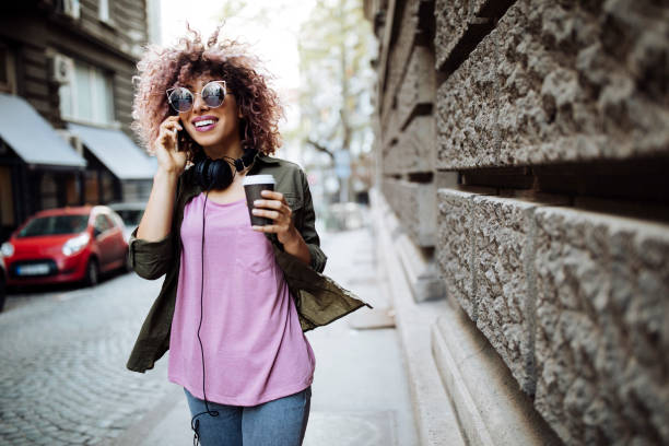 istock Walking and talking on the phone 955244698