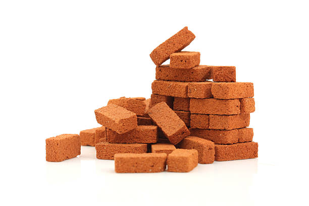 Big pile of bricks isolated stock photo