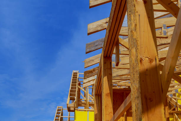 istock New home construction framing of a house on clear day 955248506
