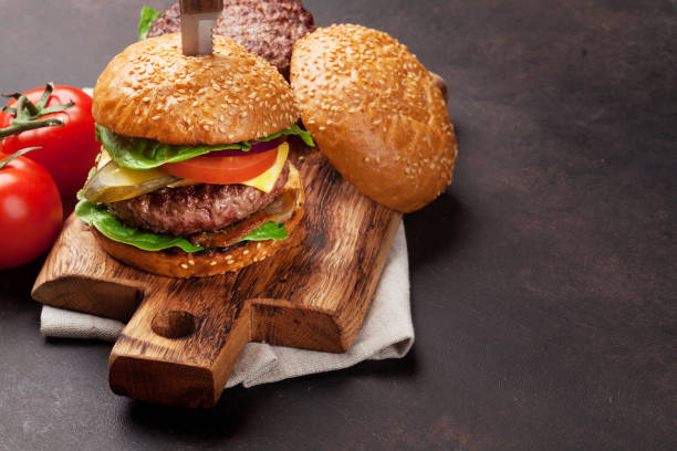 istock Tasty grilled home made burgers 955263236