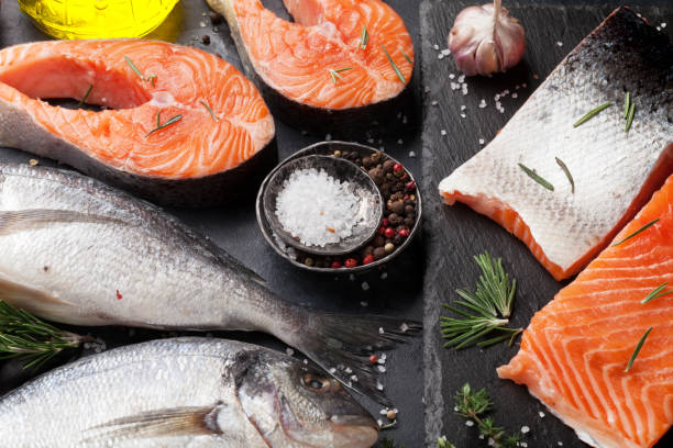 istock Raw salmon and dorado fish fillet 955263736