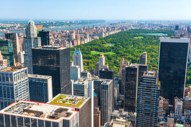 New York skyline and Central Park New York skyline and Central Park new york city built structure building exterior aerial view stock pictures, royalty-free photos & images