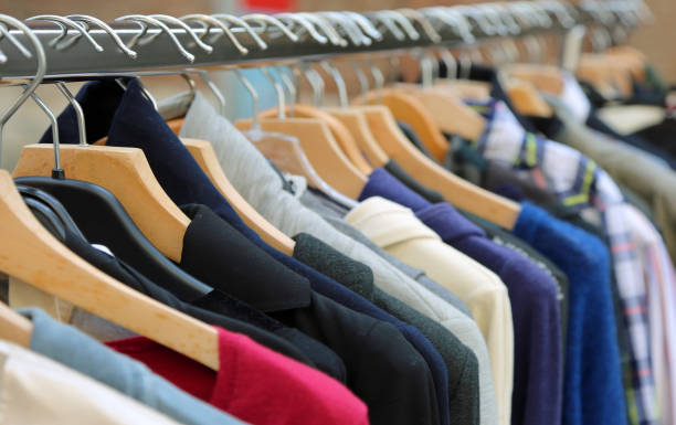 istock many coat hooks with used clothes for sale 955269204