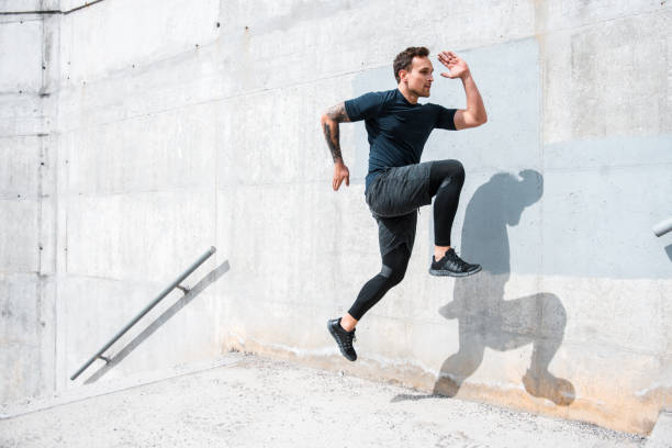 istock Man running and jumping on the stairs 955272198