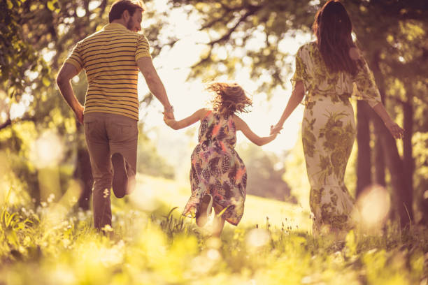 istock Family spending time together outside. 955277386