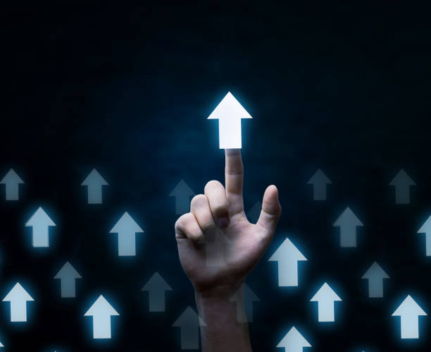 istock Hand touching arrows. Business growth and success concept. 955277522