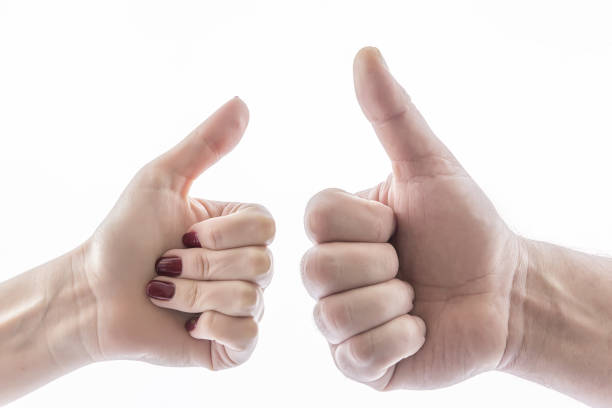 istock two hands show OK, fuck, Fig, good, bad 955279676