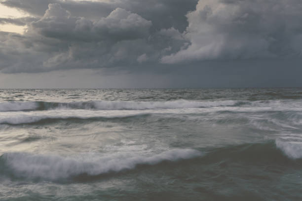 istock Storm in ocean with big windy waves Northeast Atlantic Coast enhanced sky toned 955281624