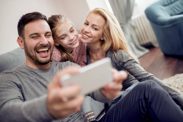 istock Family taking selfie 955284286