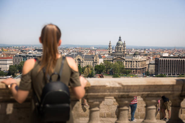 istock Young woman traveler looking at Danube river, Budapest, Hungary 955291872