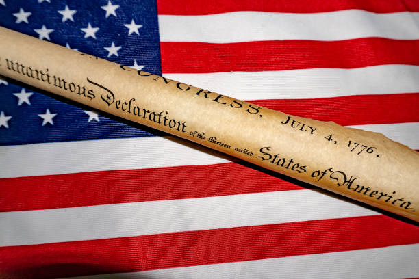 istock Declaration of independence 4th july 1776 on usa flag 955309296