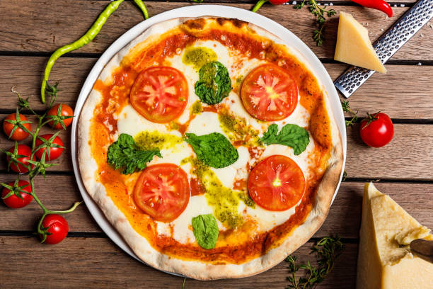 istock Pizza with artichoke, cheese and vegetable 955309448