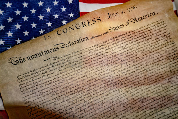 istock Declaration of independence 4th july 1776 on usa flag 955310134