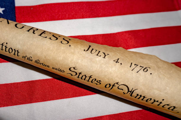 istock Declaration of independence 4th july 1776 on usa flag 955310744
