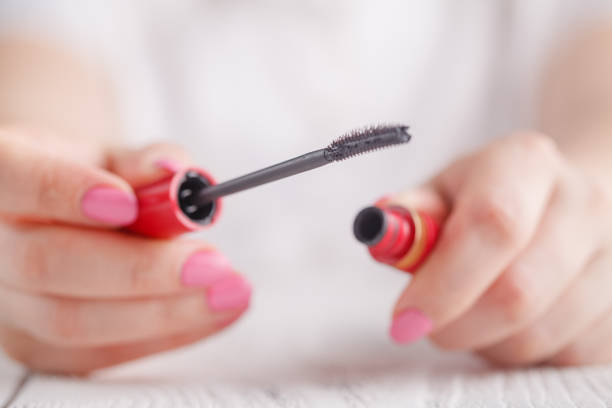 istock black mascara wand and tube 955315030