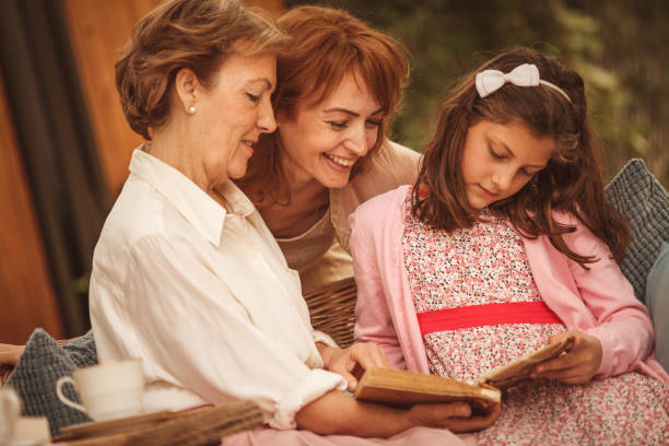 istock Looking at family photos 955319364