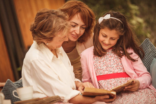 istock Looking at family photos 955319366
