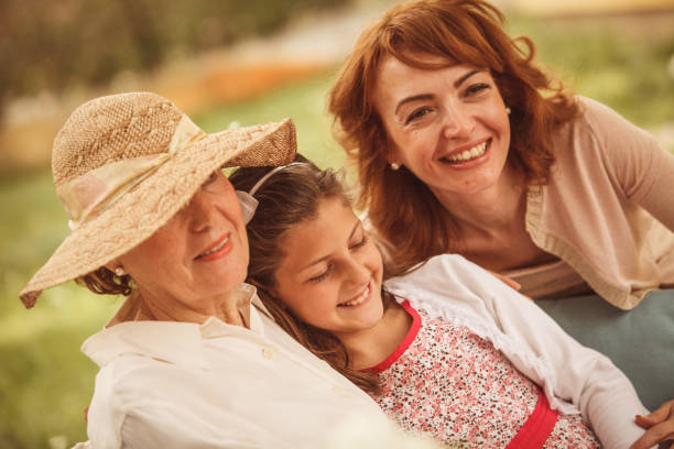 istock Three generations of happy women 955326392
