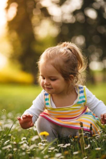 istock Happy girl playing on a meadow 955332018