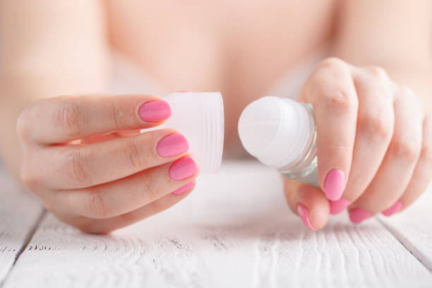 Roll-on deodorant in the female hand