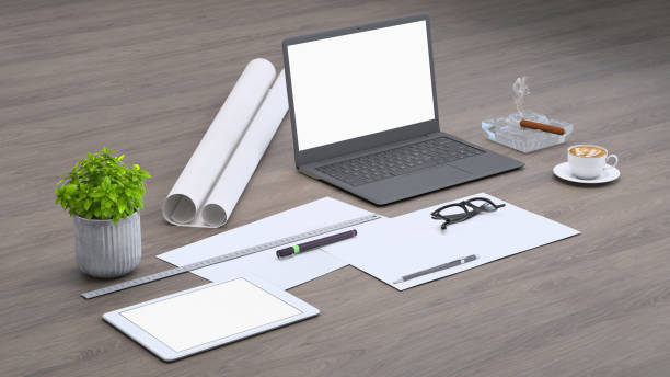istock Laptop on a desk with accessories, blank screen mock-up isometric 955345956