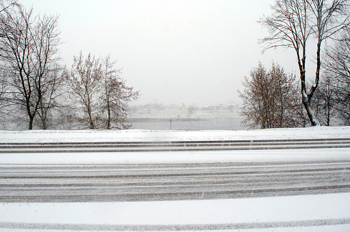 Snow and ice on the road. Kaunas, Lithuania.