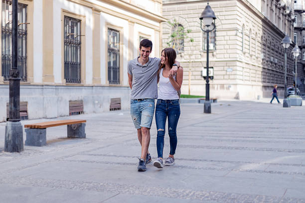 istock Happy couple in love having fun outdoors and smiling. 955366644