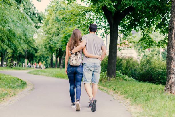 istock Happy couple in love having fun outdoors and smiling. 955366876