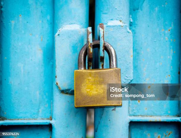 Key Lock Old Stitched In The Blue Door Stock Photo - Download Image Now - Lock, Locking, Door