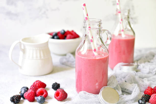 istock Berry smoothies in a vintage bottles 955393126