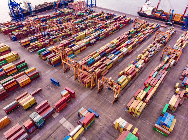 istock Aerial View of Dock with Containers 955399986
