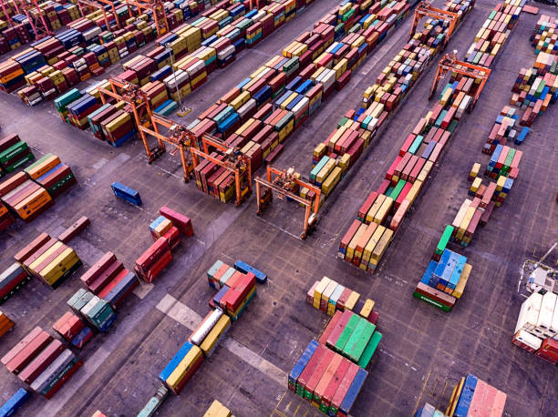 istock Aerial View of Dock with Containers 955402344