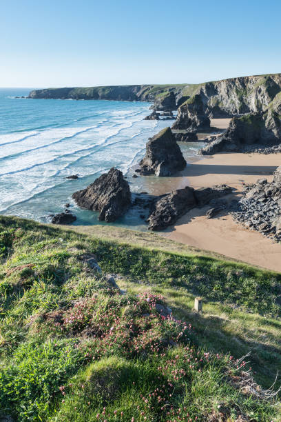 istock Stunning dusk sunset landscape image of Bedruthan Steps on West Cornwall coast in England 955402516