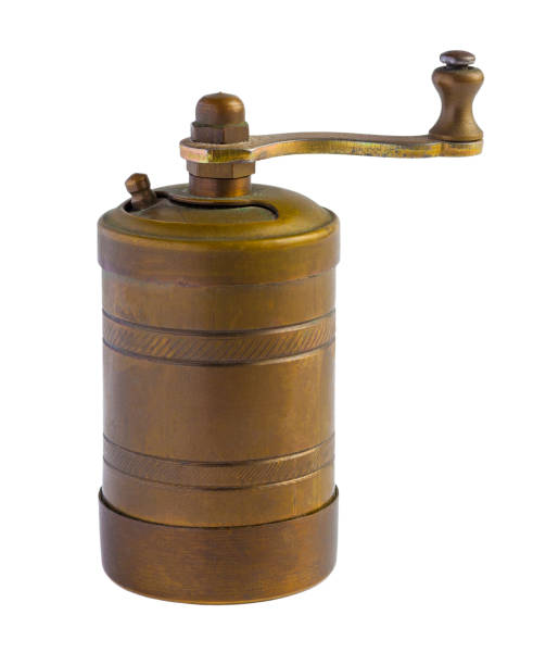 istock Vintage copper pepper mill isolated on a white background 955407680