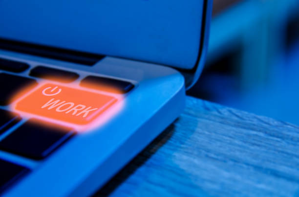 istock Concept of the Programmer need to take a break or rest, the laptop backlight keyboard detail with power Button 955438974