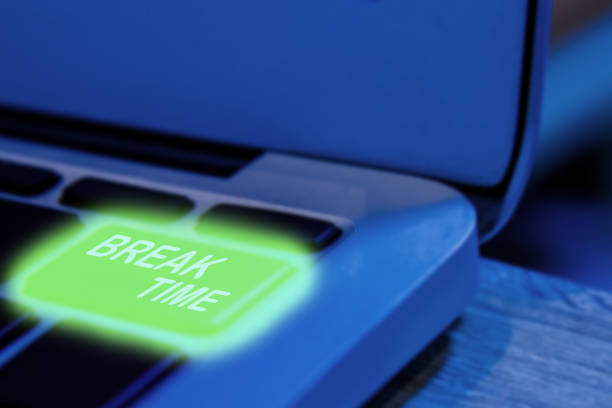 istock Close up view on conceptual keyboard - the take a break or rest, laptop with green backlight keyboard detail 955438976