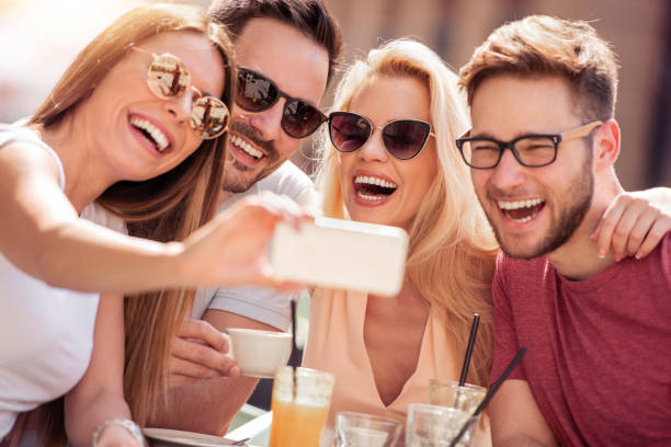 istock Friends having great time in cafe 955443318