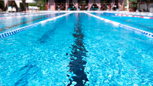 lane swimming pool. closeup of the row of lanes in the swimming pool - quiet time imagens e fotografias de stock