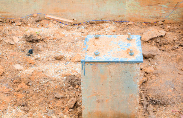 istock cement pillar in pit and sheet steel in construction work site 955453246