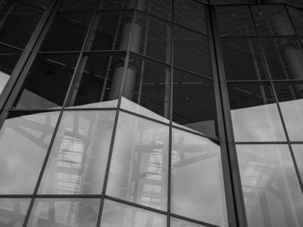 istock The glass architecture in city against a sky 955453882