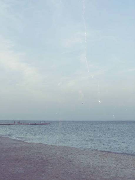 istock Deserted afternoon beach, calm sea 955458834