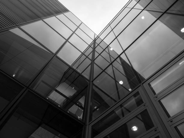 istock The glass architecture in city against a sky 955463828