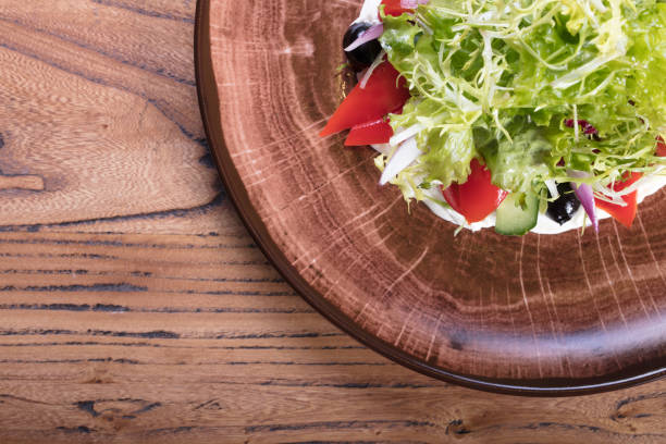 Very tasty vegetable salad with tomato and olives. Delicious vegetable salad with tomato and olives.