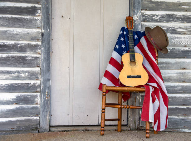 istock American flag and guitar on chair 955487426